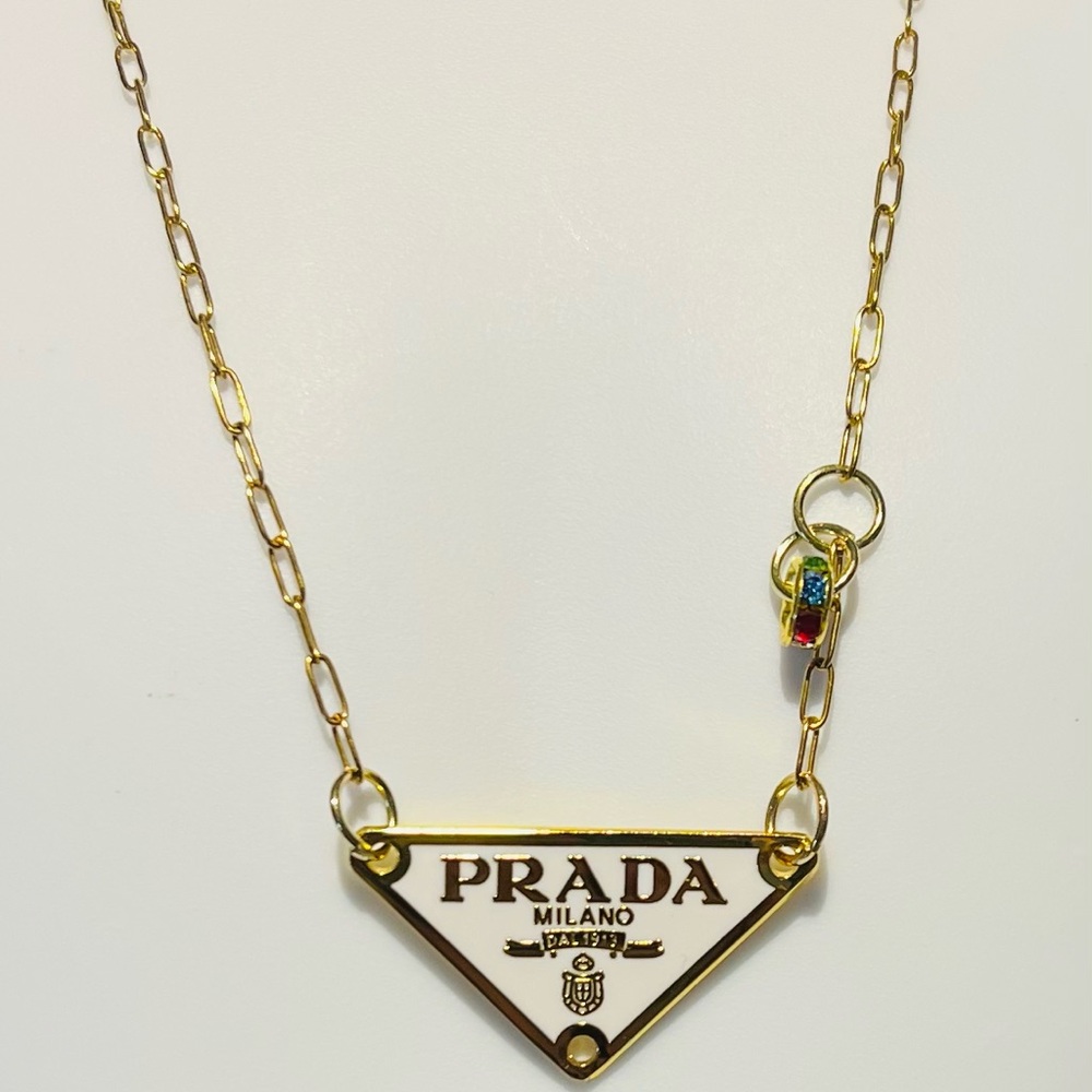 Gold Necklace with White Pendant and Multicolor Charm